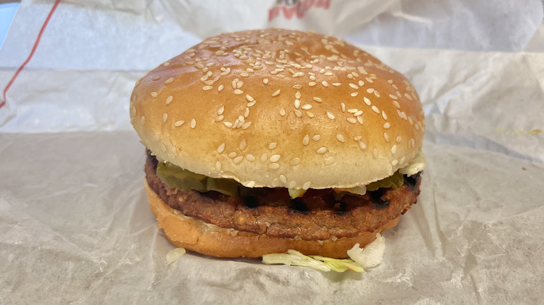Side view of Impossible Whopper on a wrapper