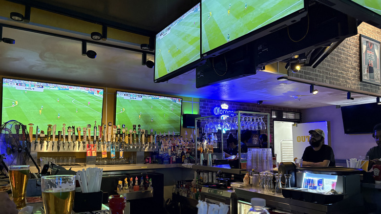 The bar at Buffalo Wild Wings with TVs playing the Mexico/South Africa 2026 World Cup match