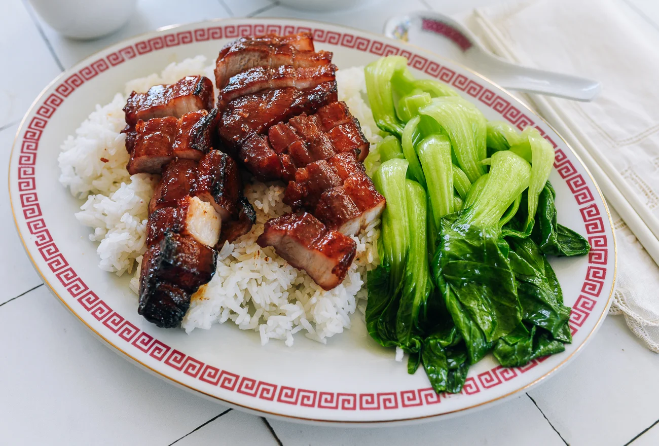 Char Siu Pork Belly on plate with steamed rice and blanched bok choy