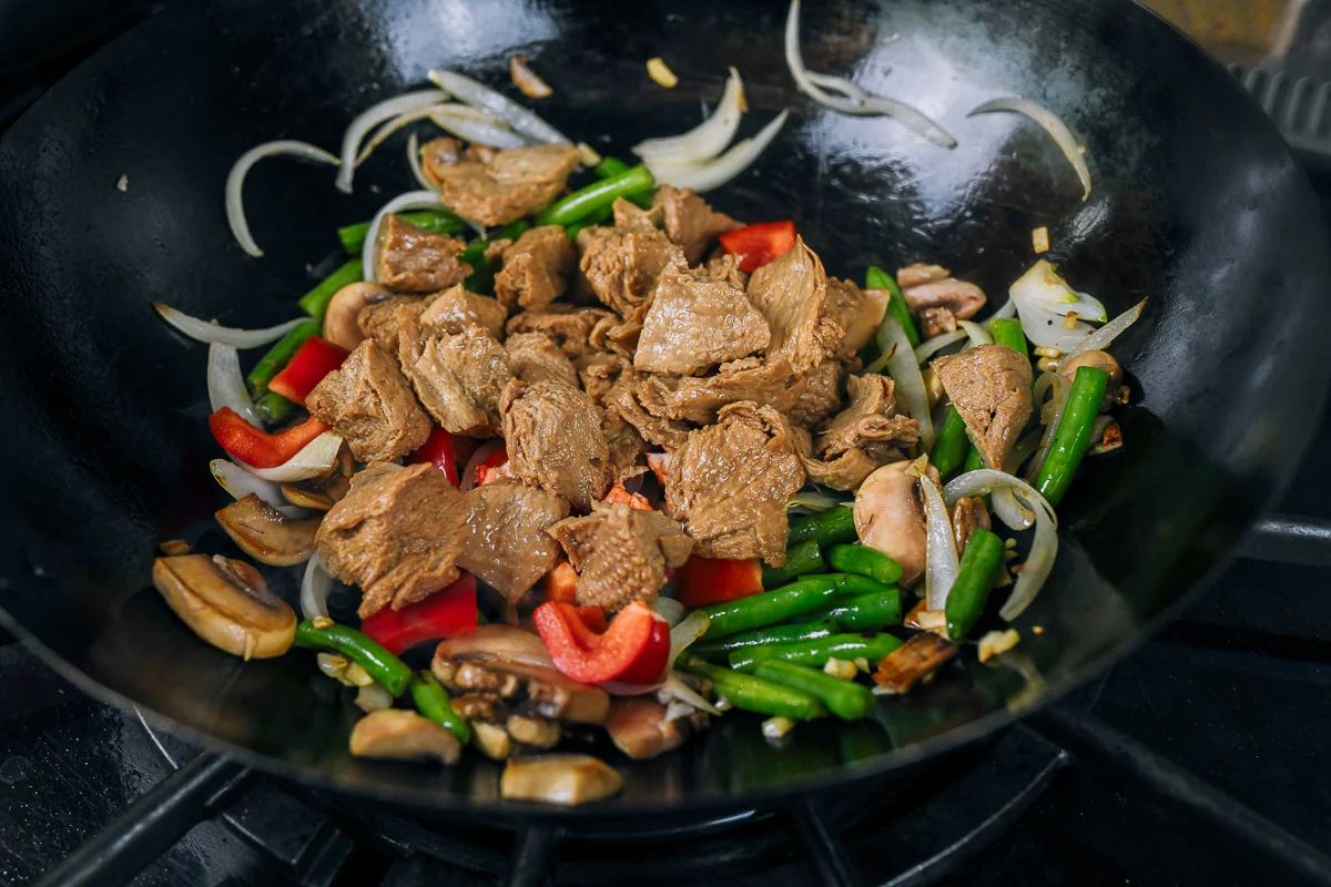 adding mock duck to vegetables
