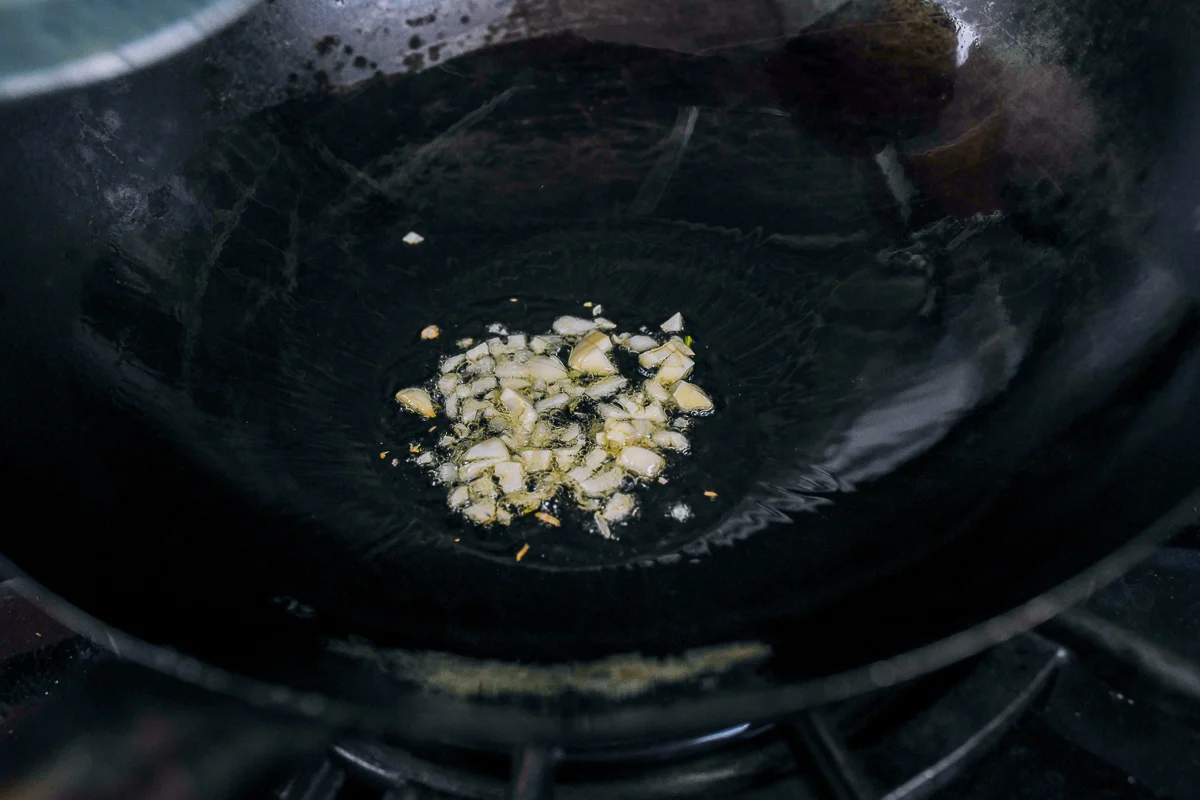 chopped garlic in wok