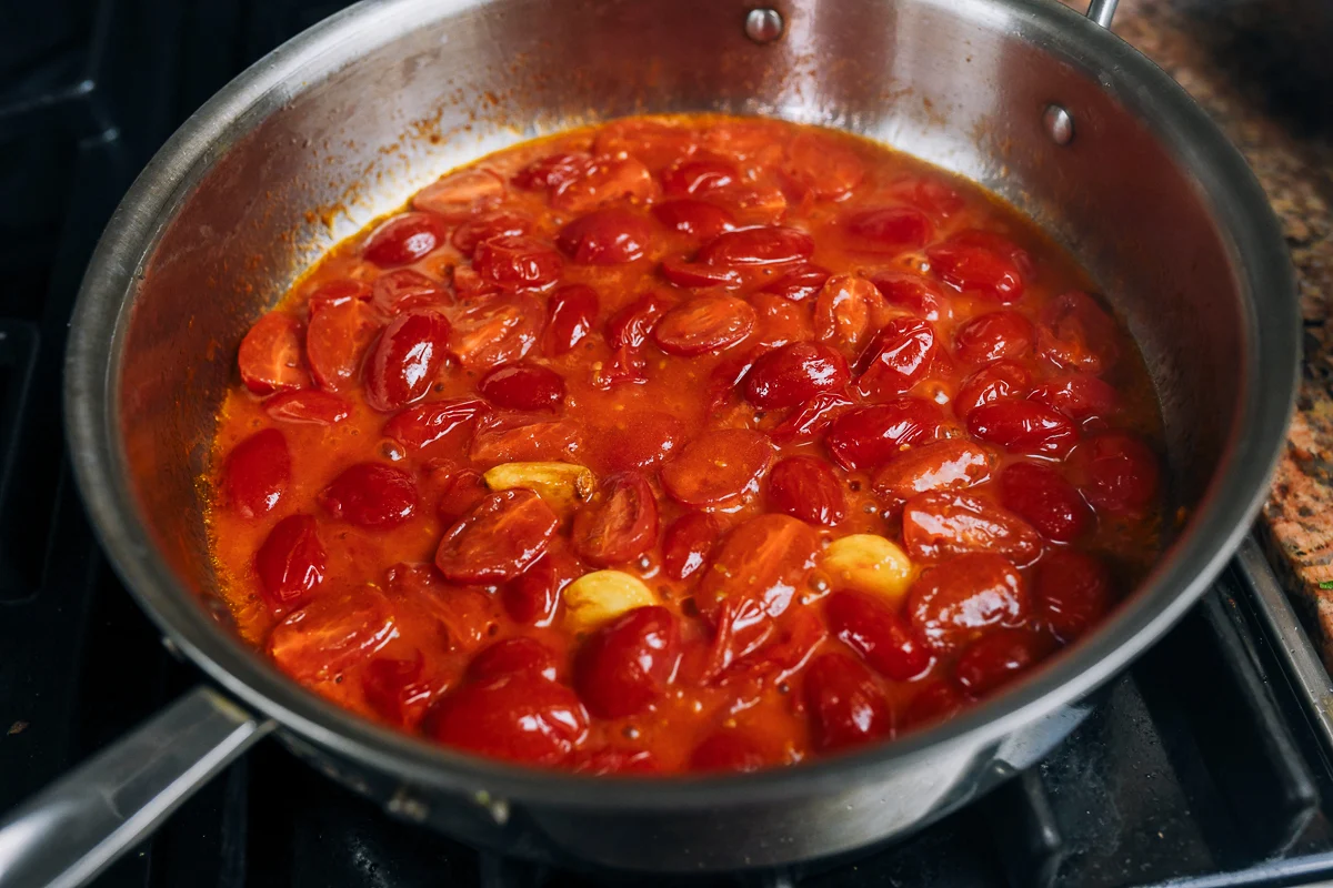 tomatoes breaking down into a sauce