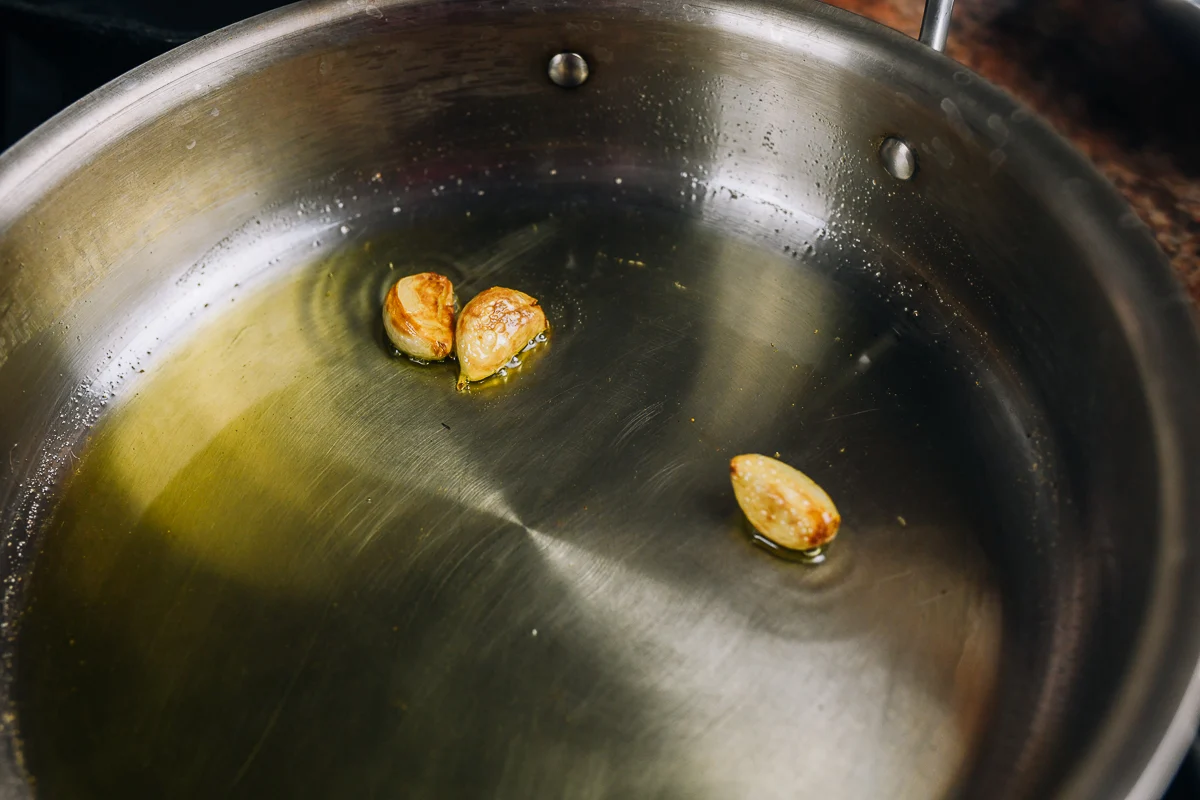 cooking garlic in olive oil in skillet