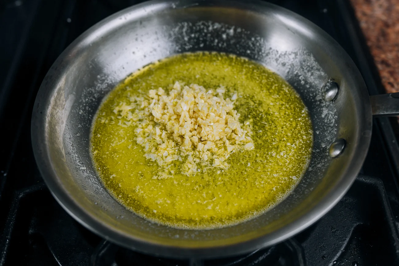 butter and garlic in pan