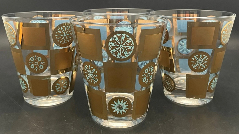 Culver lowball whiskey glasses in blue and gold Carnival pattern