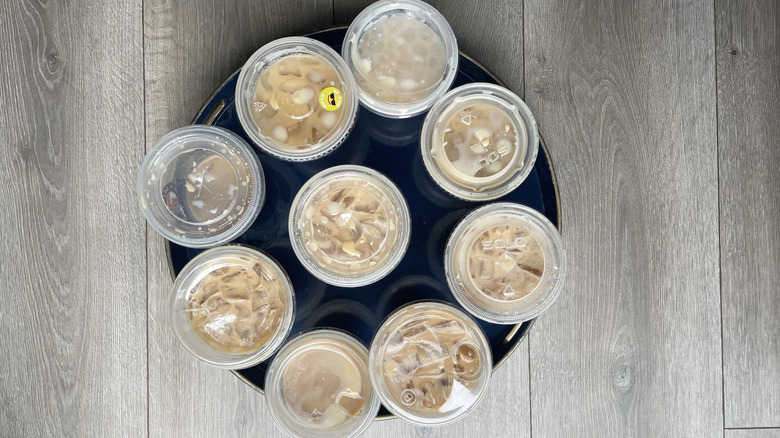 A tray of iced lattes from overhead