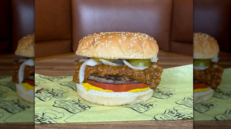 Chiliburger from The Hat sitting on a wrapper.