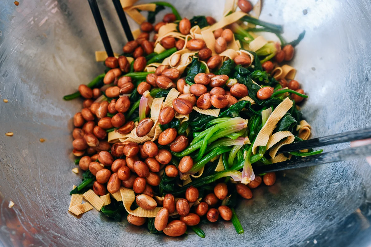 wok roasted peanuts added to spinach and tofu skin