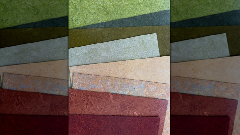 An array of Marmoleum tiles in different colors laid out in a display