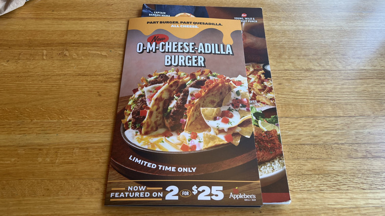 Applebee's O-M-Cheese-adilla burger special shown on menu
