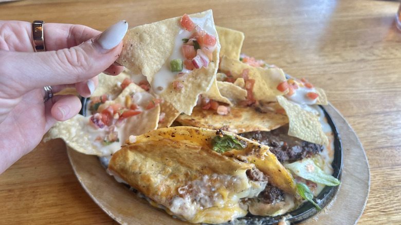 Close up of Applebee's O-M-Cheese-adilla burger and tortilla chipsEDGE