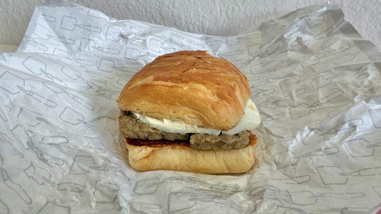 Sausage, Egg & Swiss Croissant sandwich on a wrapper