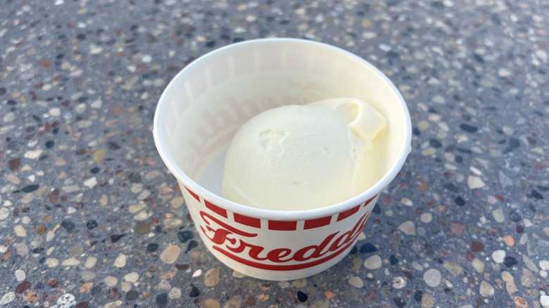 Freddy's frozen vanilla custard in paper cup.