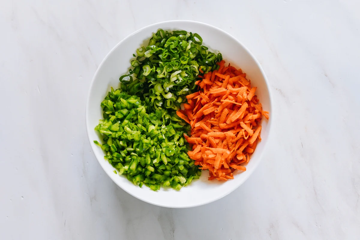 shredded and chopped vegetables in a dish