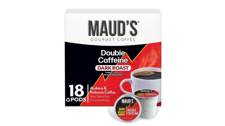 A box of 18 Maud's Double Caffeine Dark Roast coffee pods, with a couple in the front, all on a white background