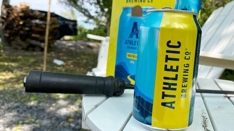 Can of Run blue and yellow Wild IPA on a wooden table