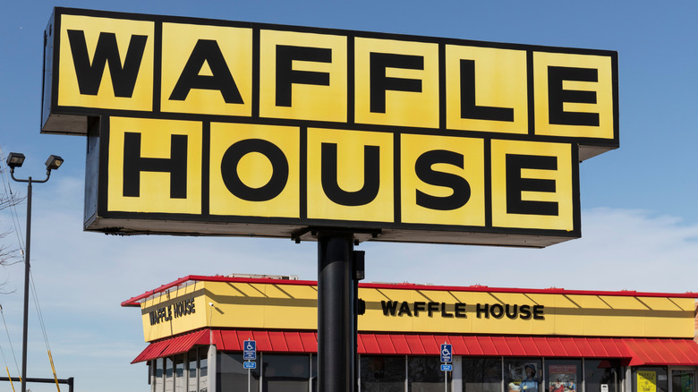 Waffle House sign and restaurant in background