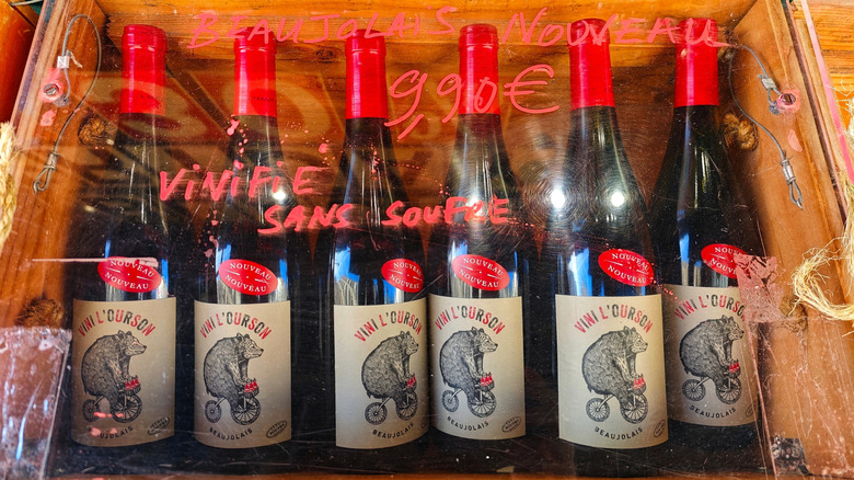 Bottles of Beaujolais nouveau in a wooden box