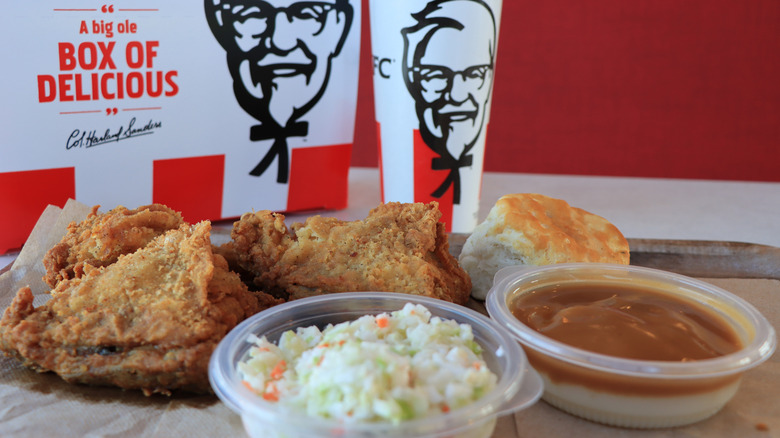 KFC meal with chicken and sides of mashed potato with gravy and coleslaw