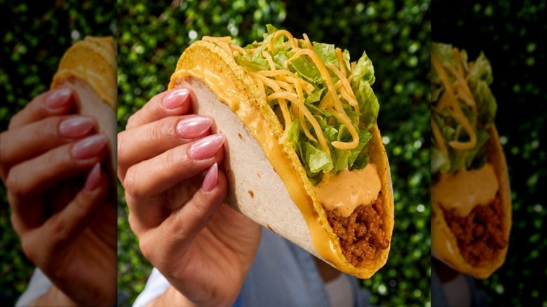 hand holding Double Stacked Taco