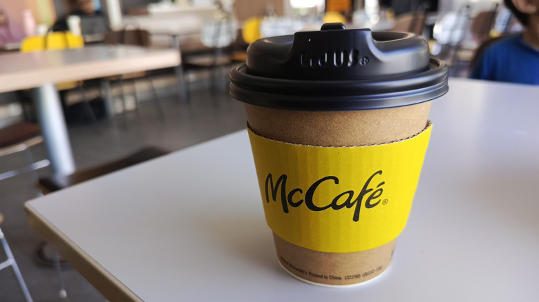 McDonald's coffee cup on table