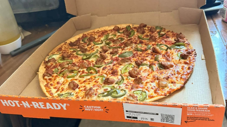 Little Caesars sausage and pepper pizza in box