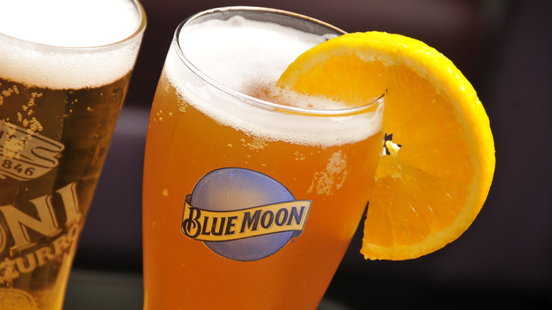 glass of Blue Moon beer with orange