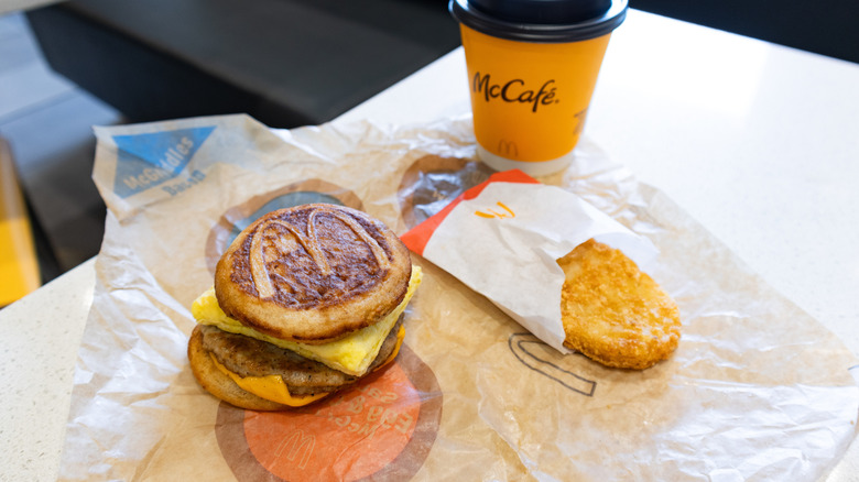 A McDonald's McGriddle, hash brown, and cup of coffee