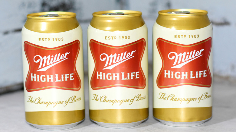 Three cans of Miller High Life