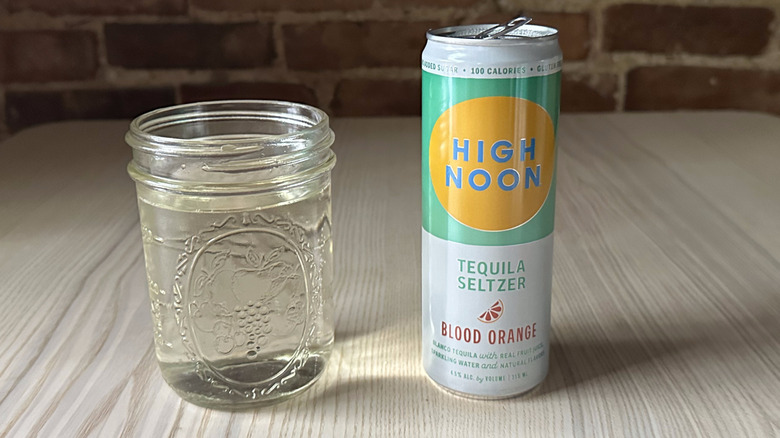 Blood Orange High Noon on table with glass