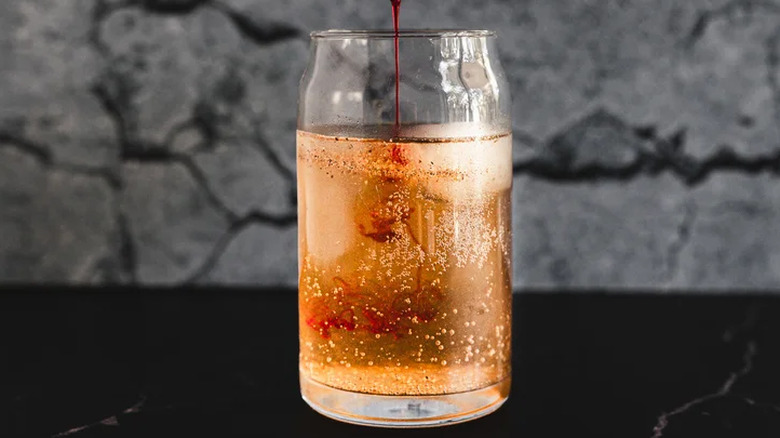 Drizzling juice into a mule