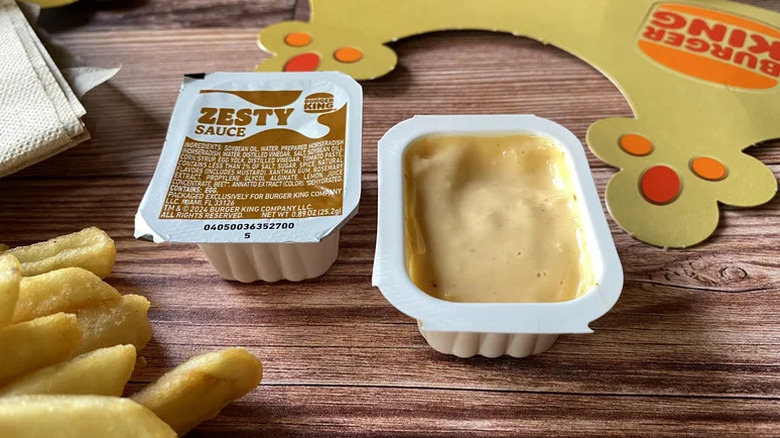 A Zesty Sauce pack open on a table