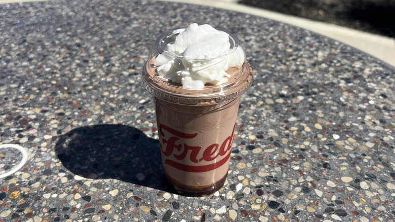 Freddy's Chocolate Brownie Delight Concrete on an outside table