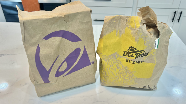Taco Bell and Del Taco to-go bags.
