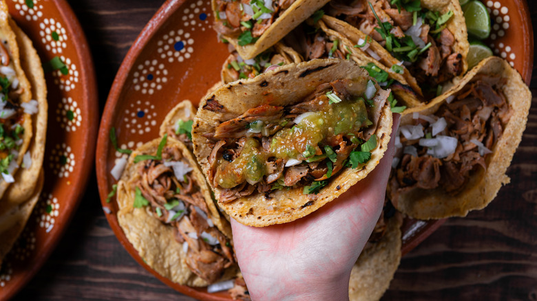 Chopped carnitas on cutting board