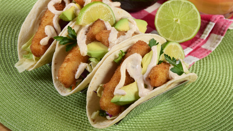 Fish tacos with avocado and crema