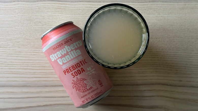 Trader Joe's Strawberry Vanilla Prebiotic Soda in blue glass