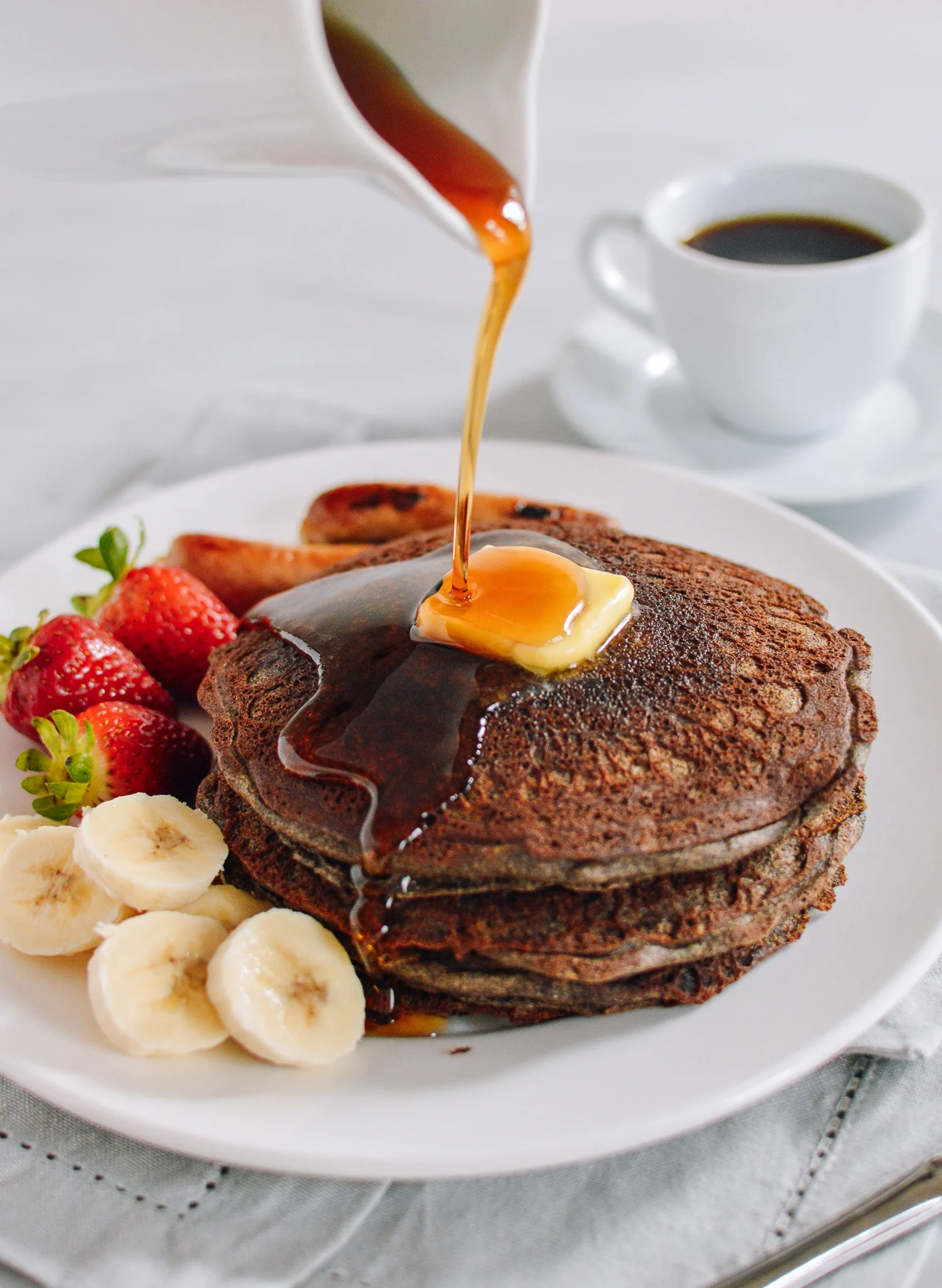 Buckwheat pancakes drizzled with maple syrup and butter, thewoksoflife.com