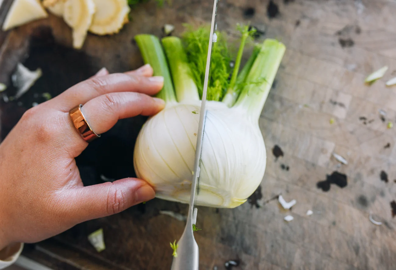 slicing fennel bulb in half lengthwise
