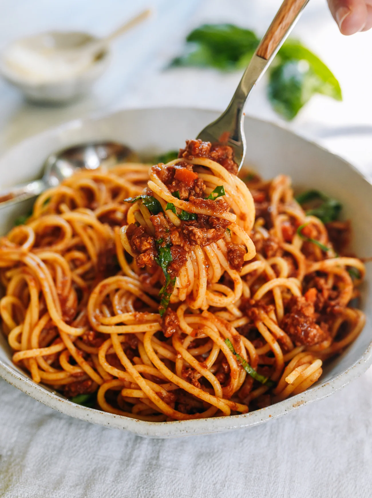 twisting spaghetti bolognese around fork