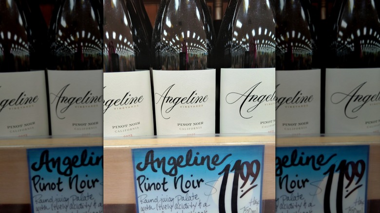 Bottles of Angeline Pinot Noir on shelf at Trader Joe's
