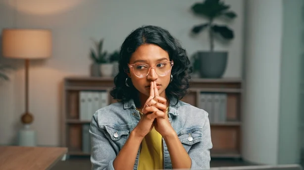 woman looking unsure and anxious